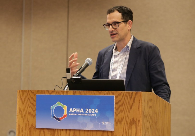 Man presenting at annual meeting