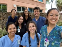 Student Champions for Climate Justice awardees in Hawaii posing in medical uniforms