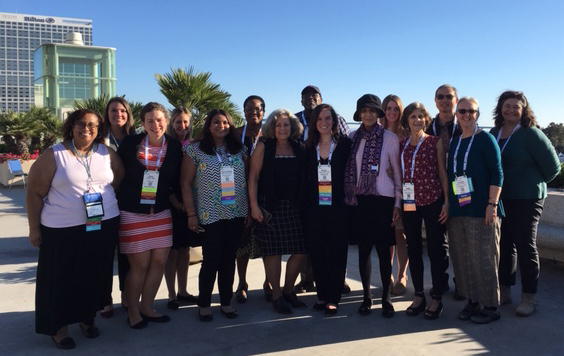 ISC Steering Committee members smiling for group photo outside in San Diego