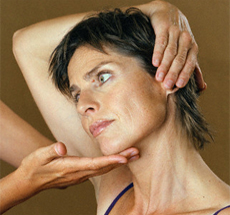Woman getting neck adjusted by chiropractor 