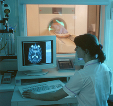 Radiology technician using computer imaging